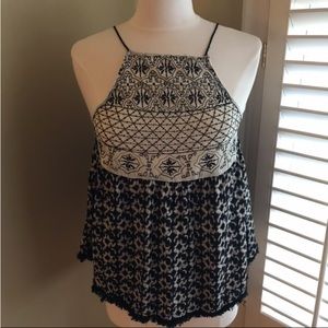 NWT Alter’d state fun black and white tank. It has a fringe around the bottom.